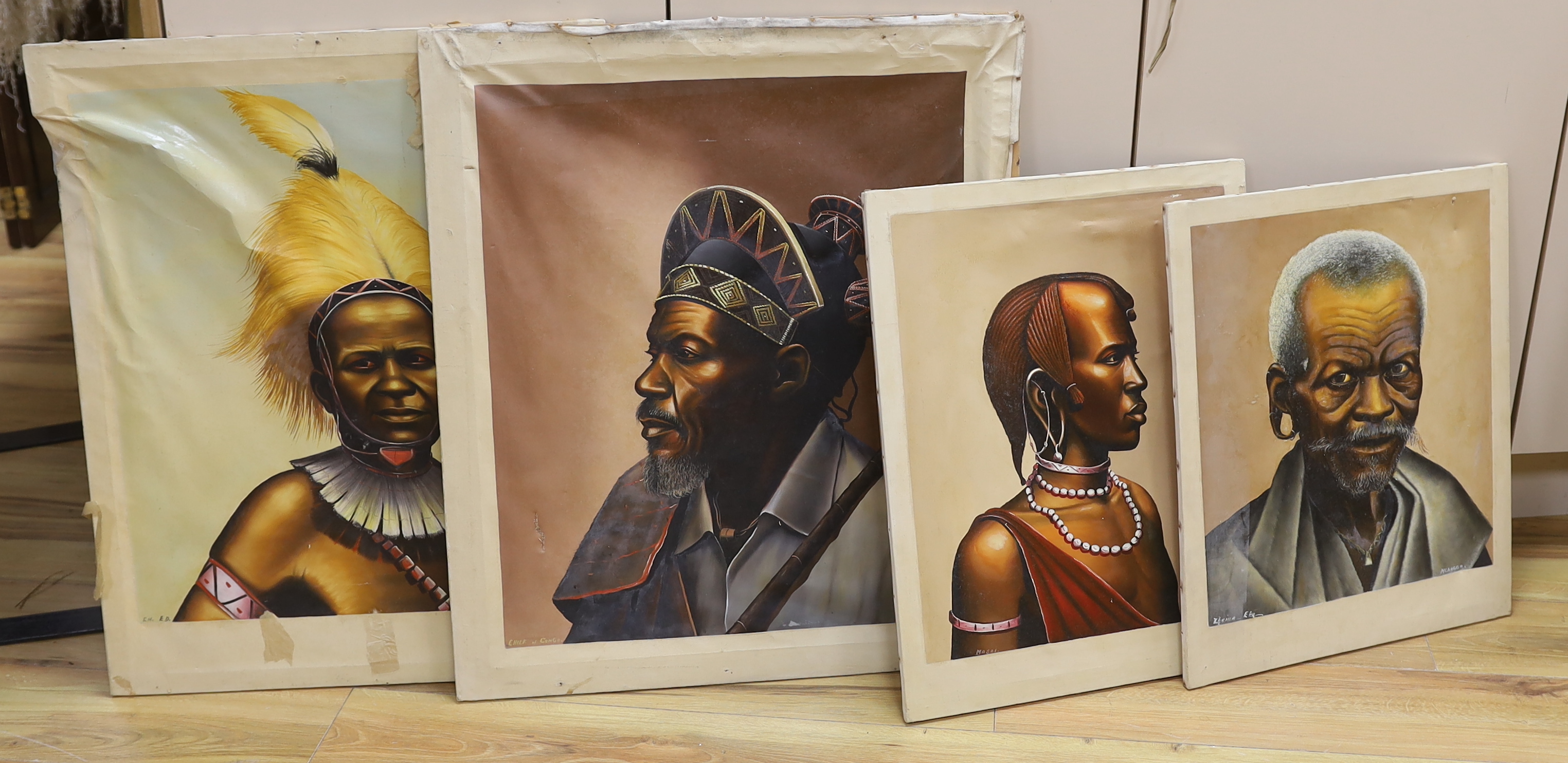 African School, four oils on canvas, including ‘Chief of Congo’ and ‘Bakuria Dance’, unframed, largest 72 x 62cm